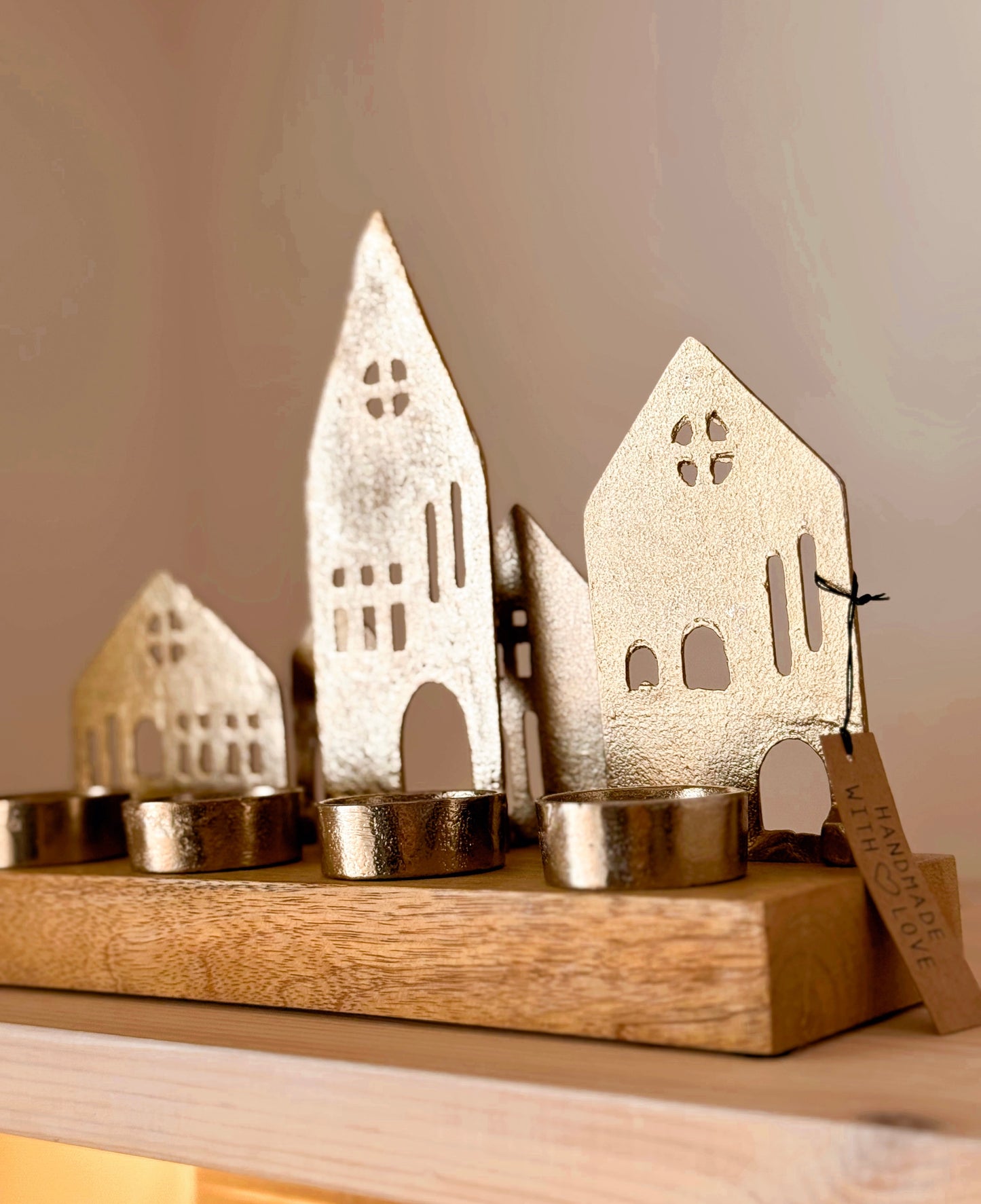 Suporte para velas casas douradas