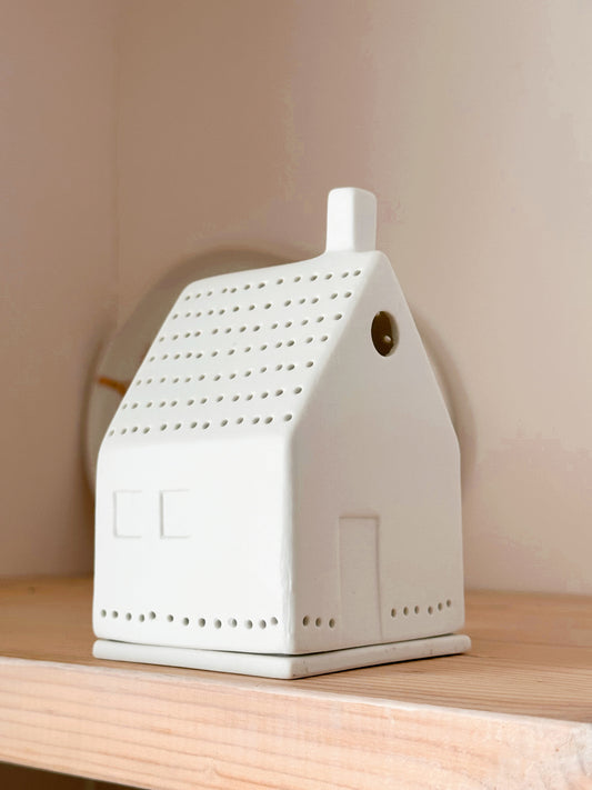 Casa pequena pontinhos telhado