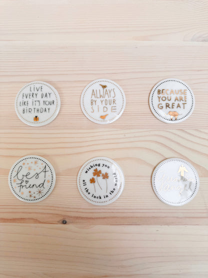 Medalha porcelana frases