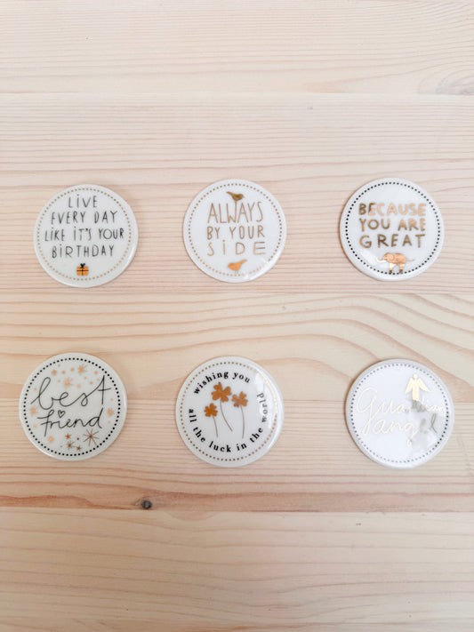 Medalha porcelana frases